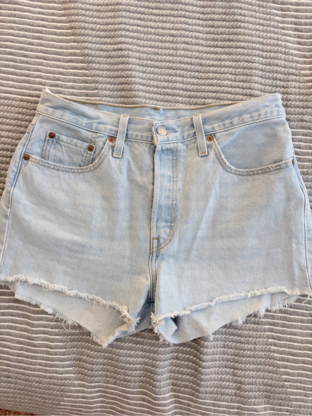 Levi's Pale Blue Cutoff Denim Shorts with Frayed Hem